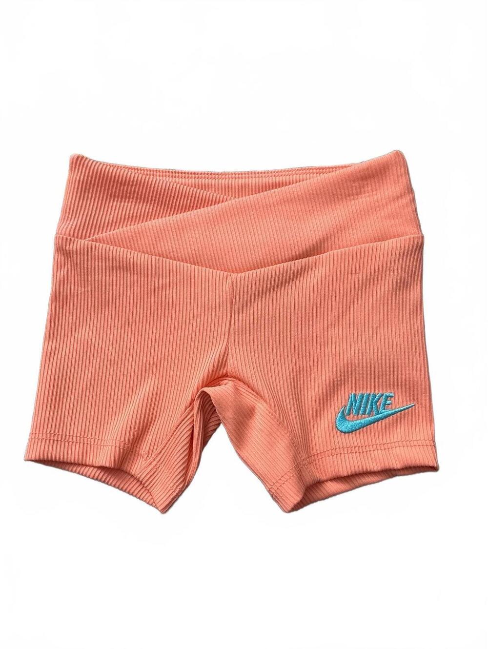 Nike Girls' Ribbed Peach Shorts with Blue Logo Size 4T